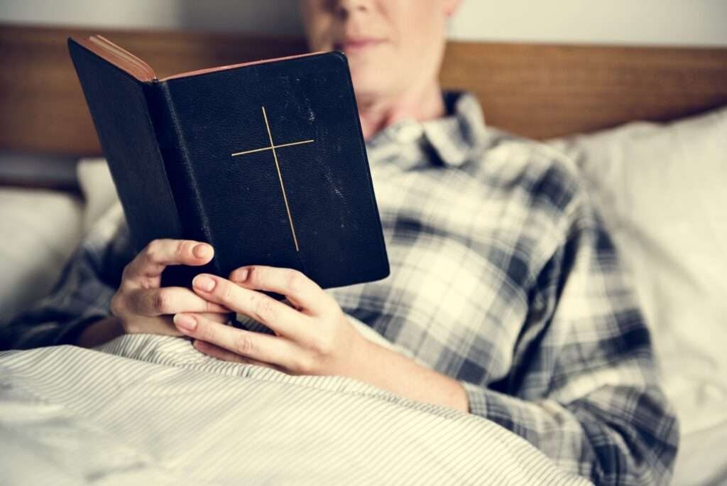 A woman reading a bible